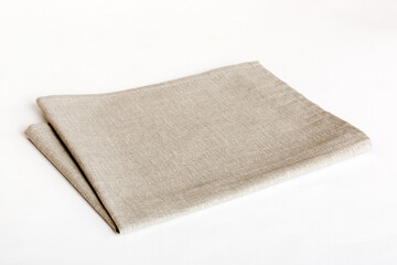 top view with gray kitchen napkin isolated on table background. Folded cloth for mockup with copy space, Flat lay. Minimal style