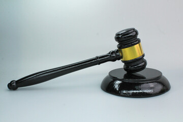 judge's gavel on a gray background. judicial or lawyer concept