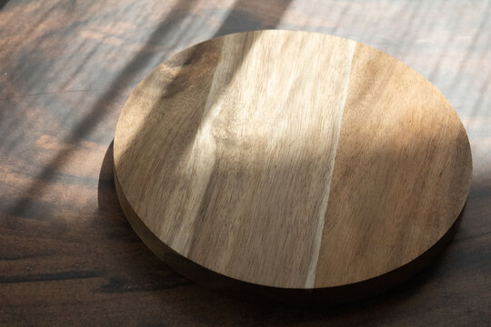 photo round wooden board side view from above
