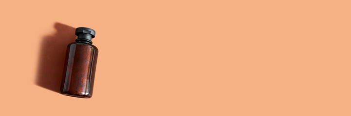 Abstract bottle at beige background with bottle shadow. Top view of shampoo, bath gel or lotion...