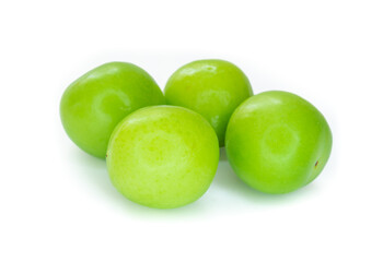Fresh ripe green plum fruits isolated on a white background. Closeup, clipping path.