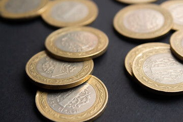 Turkish lira coins on black background. Closeup photo of Turkish coin moneys.