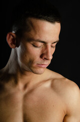 Fototapeta premium Young attractive man posing in the studio. 