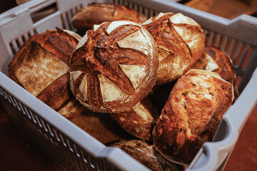Organic Bakery - details of baker baking bread