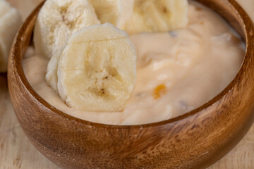 fresh banana-flavored yogurt with banana slices