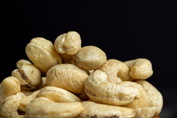 Hard roasted and peeled cashew nuts on the table