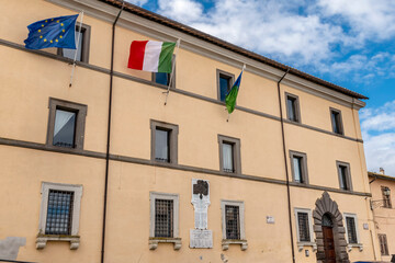Fototapeta na wymiar The facade of the town hall of Capodimonte, Viterbo, Italy