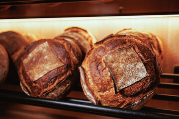 Organic Bakery - details of baker baking bread