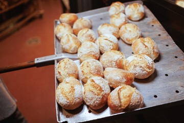 Organic Bakery - details of baker baking bread