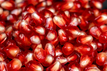 Red ripe pomegranate seeds with lots of juice