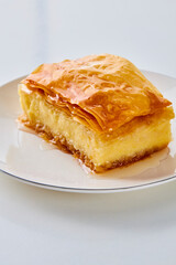 piece of galaktoboureko on a white plate