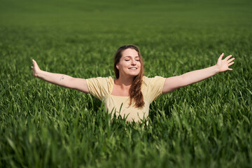 Plus size woman in a wheat field