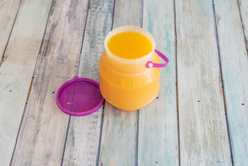 Orange juice is a fruit juice in liquid form obtained by squeezing the inside of oranges, usually with a juicer. The largest exporter of orange juice is Brazil, followed by the United States