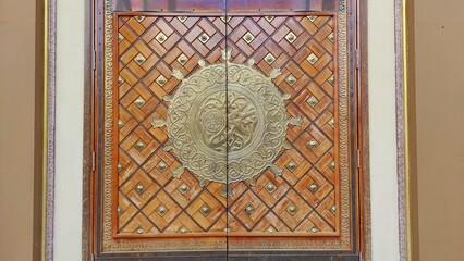 The door asian architecture of mosque with islamic ornament and decoration on it