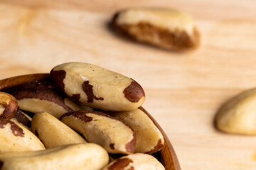 Fresh Brazil nuts peeled from the shell on the table