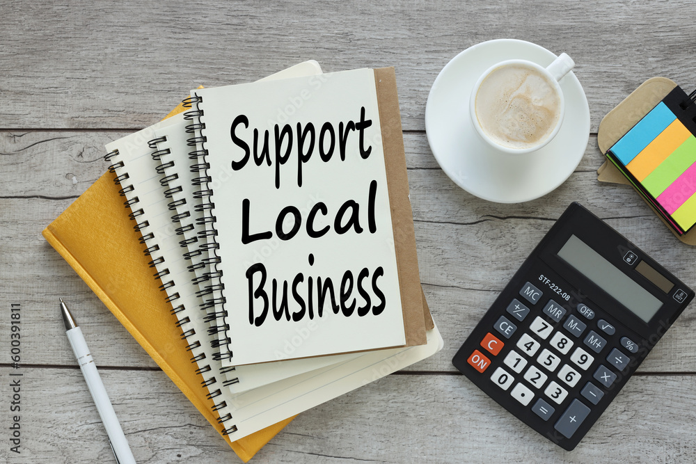 Poster Support local business. top view of four notepads with text
