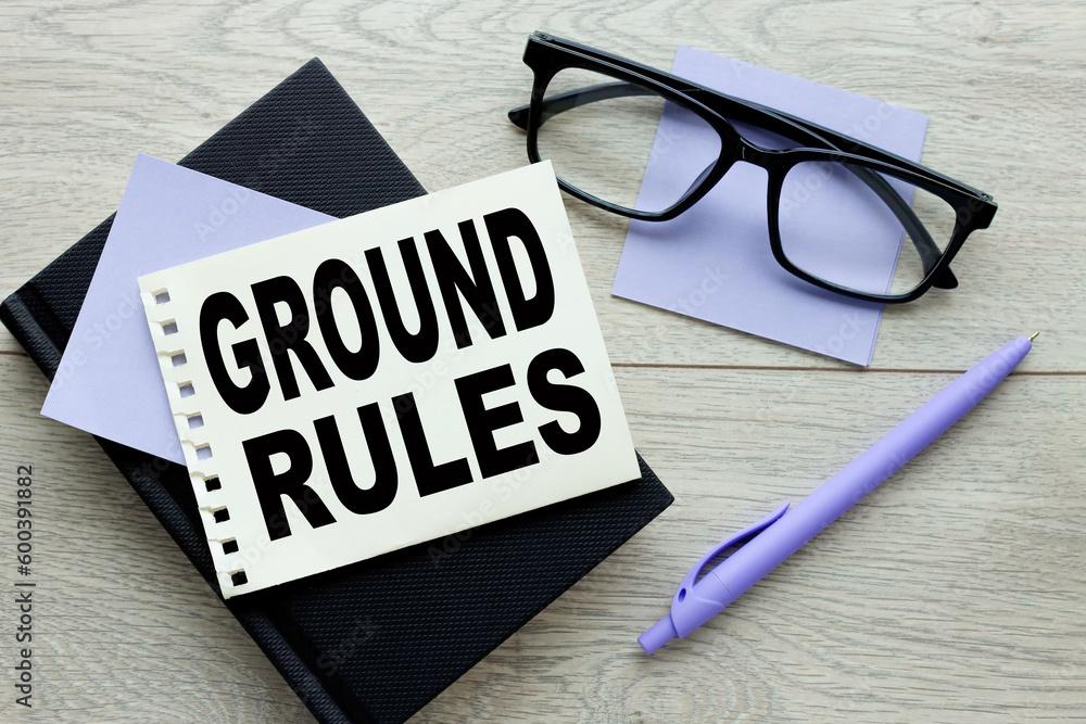 Poster on a light background - bright multicolored stickers with the text ground rules. copy space