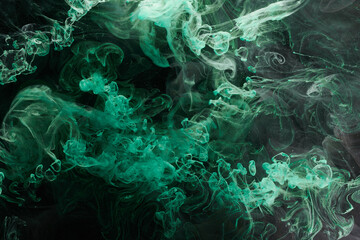Green color abstract smoke background. Mix alcohol ink, creative liquid art mock-up with copy space. Acrylic paint waves underwater
