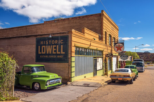 Lowell, Arizona, USA - October 17, 2018 : Historic Erie street with a vintage 1956 Ford F-100 car in Lowell. This ghost town situated on the other side of the Lavender Pit Mine is now part of Bisbee.