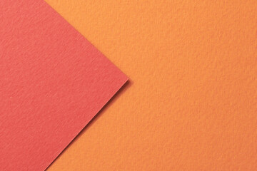 Fototapeta premium Rough kraft paper background, paper texture orange red colors. Mockup with copy space for text