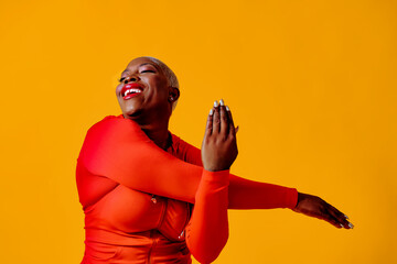 woman wearing red jumpsuit stretching arm