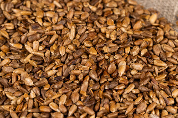 heavily fried sunflower seeds close up