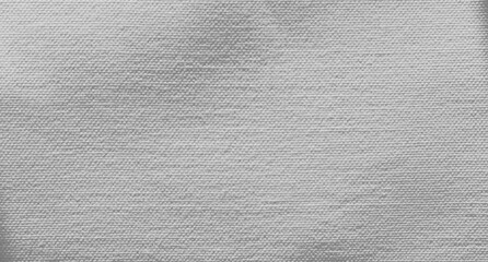 Snow white canvas background. Surface of fabric texture in white winter color. 