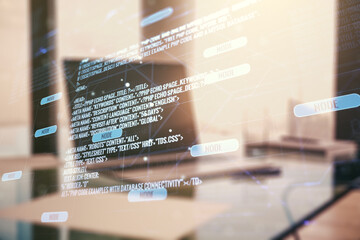 Multi exposure of abstract software development hologram on laptop background, research and analytics concept