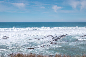 Watching huge waves roaring across the island in the Odemira region, western Portugal. Wandering...