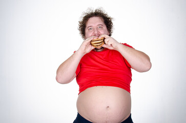 Diet and healthy lifestyle. Funny fat man eating a burger.	