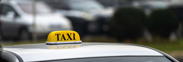 Car with taxi sign