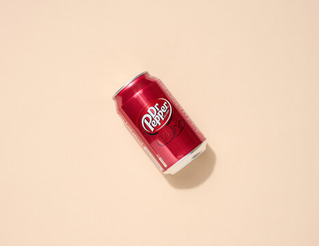 Mykolaiv, Ukraine May 6, 2023: Metal can of Dr. Pepper drink on a beige background, top view