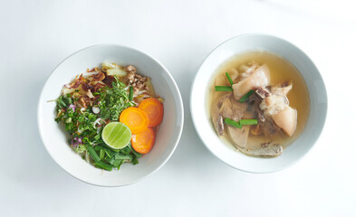 Pho Bo vietnamese soup with beef and rice noodles isolated on a white background. Top view