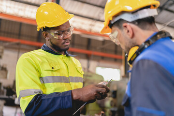 professional business industry technician wearing safety helmet working to maintenance service and checking factory equipment, a work of engineer occupation in manufacturing construction technology