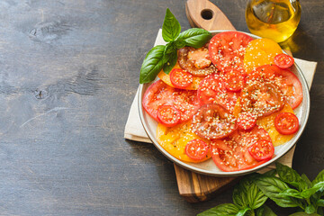 tomato salad with hemp seeds. healthy food concept with superfoods