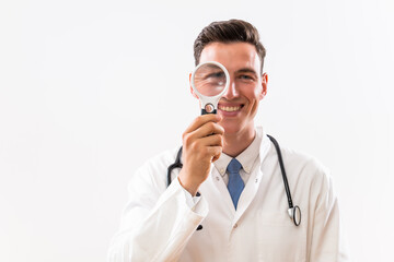 Image of  doctor looking   through loupe .