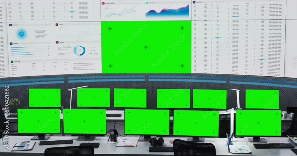 Leinwandbilder Empty Modern Monitoring Office With Green Screen Chromakey On Big Digital Screen And Desktop Computer Monitors Of Employees. Mockup Template Of Successful Data Science, Deep Learning Company Workspace