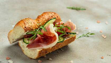 sandwich with arugula and jamon, Breakfast or brunch. Restaurant menu, dieting, cookbook recipe top view