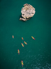 Aerial view of kayaks in the blue ocean