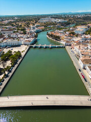 Aerial view of river running through town of Tavira, Portugal