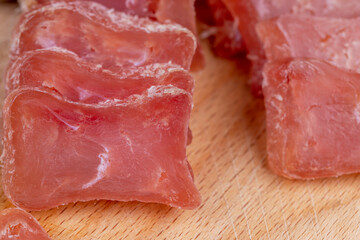 Square chicken fillet sausage, close up