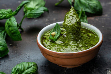 pesto sauce, Traditional Italian pesto recipe on a dark background, banner, menu, recipe place for text, top view
