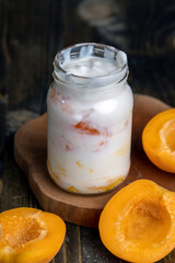 yogurt with fresh berries and apricot jam