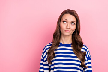 Photo portrait of young thoughtful confident woman wear trendy striped shirt looking empty space...