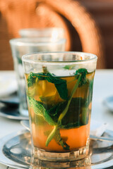 whisky maroccan mint Tea at rooftop in Jemaa el-Fna Marrakech at Night, Morocco, koutoubia