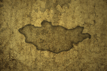 map of mongolia on a old vintage crack paper background .