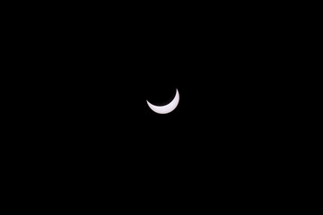 hybrid solar eclipse, Exmouth, Australia, 20.04.2023, during the solar eclipse the moon is covering...