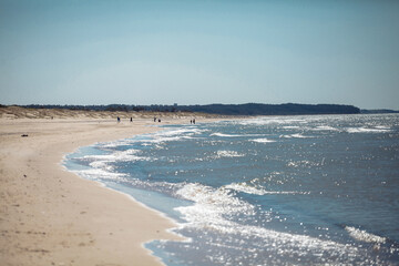 seashore with sandy beach on a sunny day