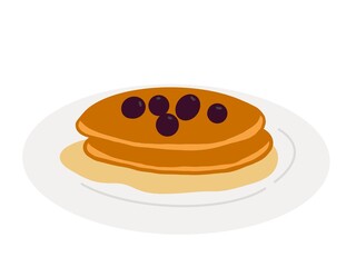Pancakes topped with dark purple blueberries. decorated on a plate.