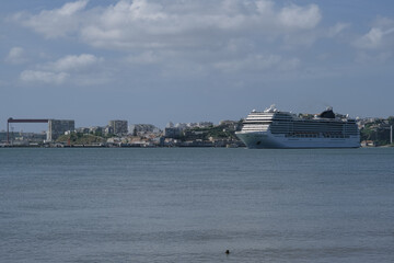 Large modern liner cruiseship cruise ship Poesia, Orchestra, Magnifica or Musica in port of Lisbon,...